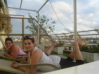 relaxing on our balcony.JPG